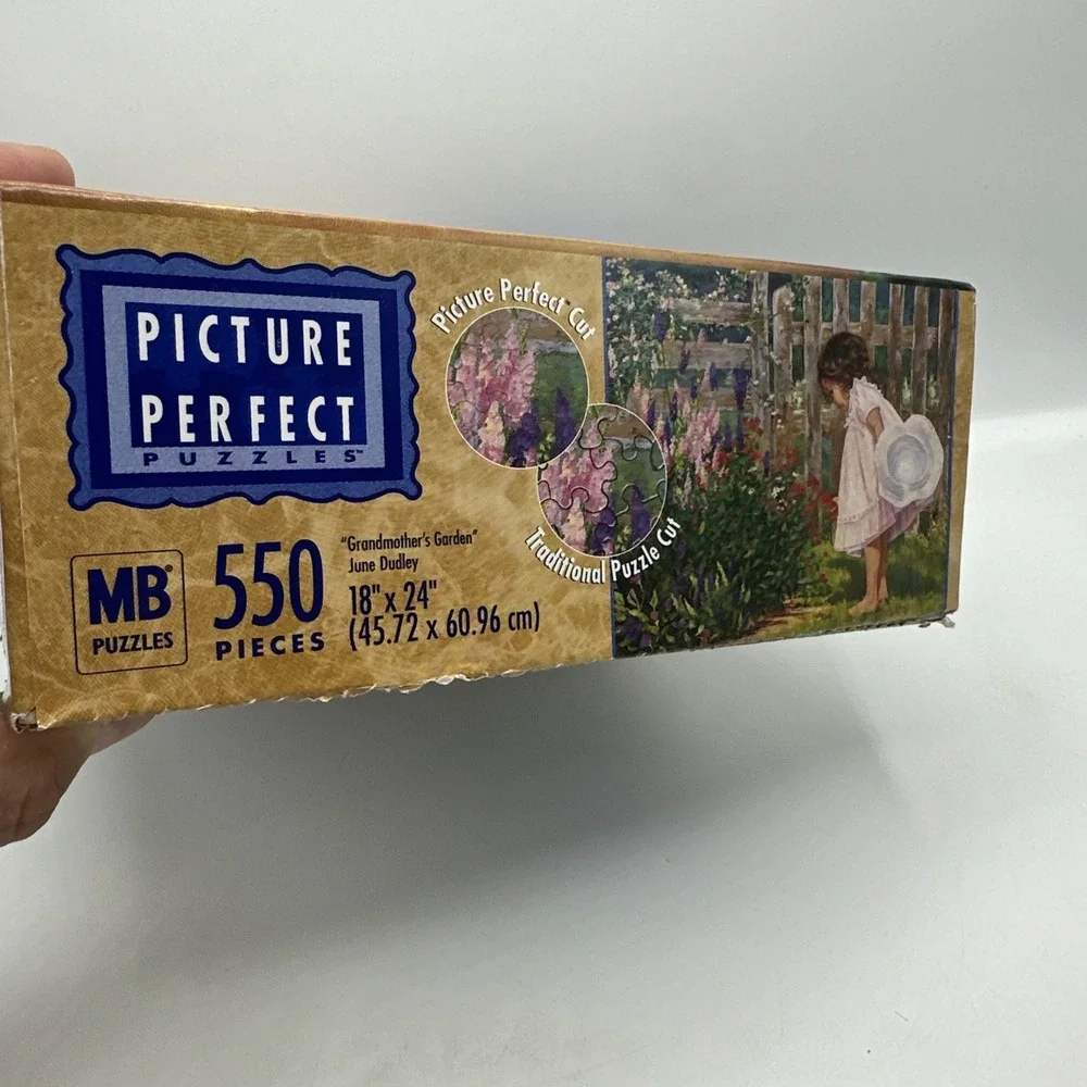 MB Puzzle Picture Perfect. Grandmother's Garden. 550 Pieces‎